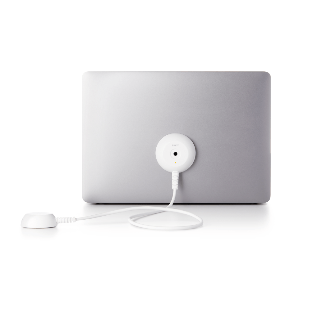 シルバーのノートパソコンに取り付けられた白いLaptop AOP