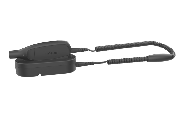 OneKEY デタッチャーは、取り外し用ケーブルが取り付けられた状態で、固定チェックアウトドックに固定されています。